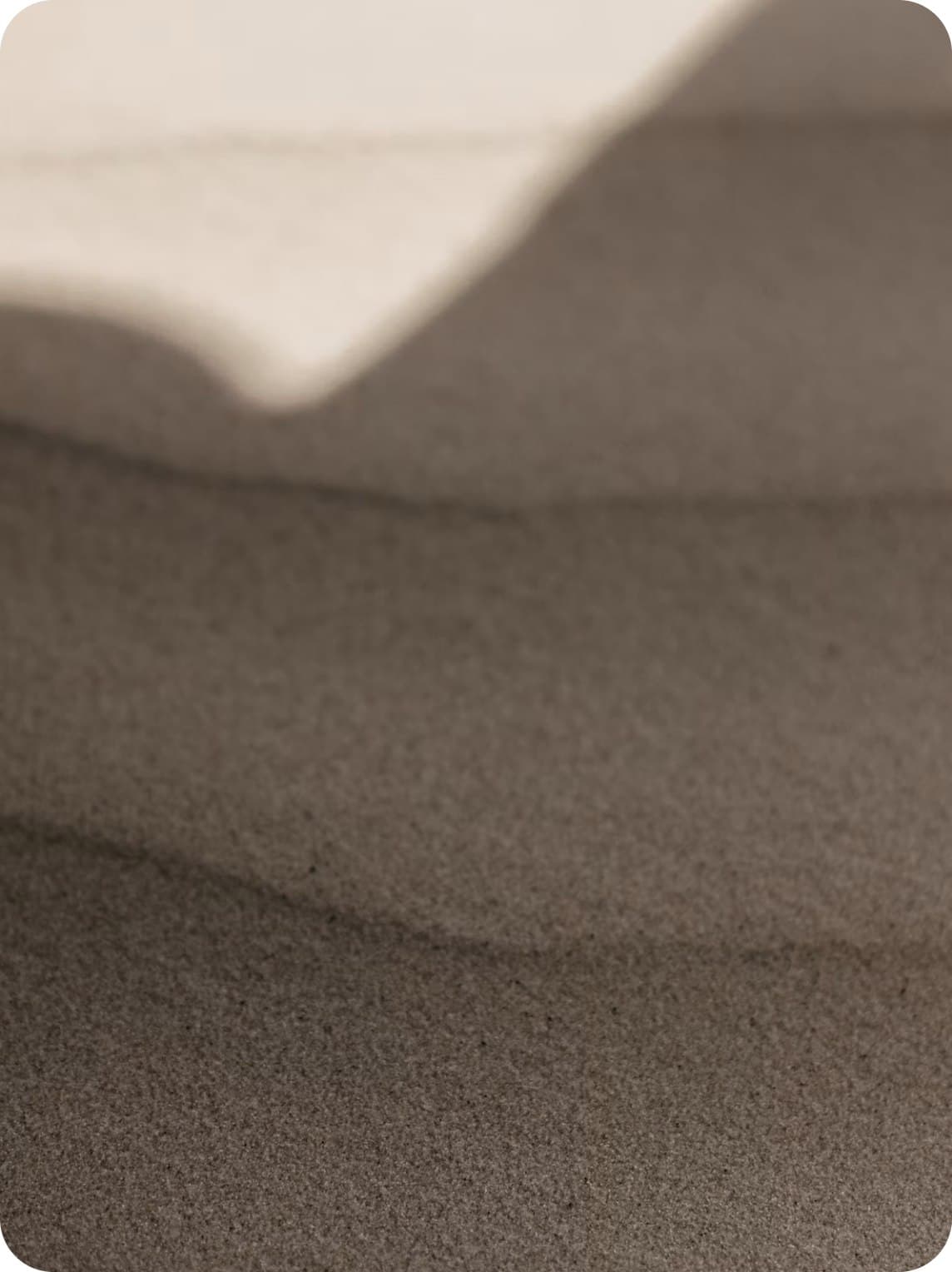 A claim detail panel over a sand backdrop